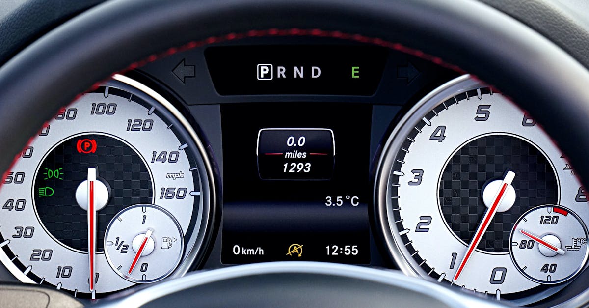 Detailed view of a car's dashboard showing speedometer, odometer, and controls.