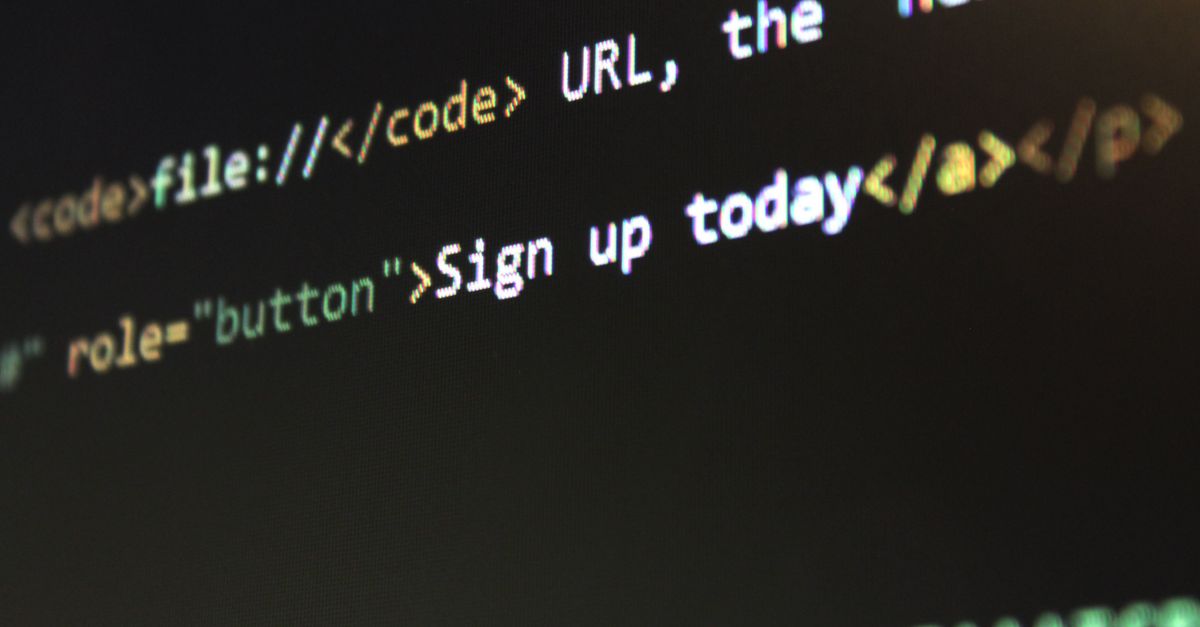 Detailed view of HTML and CSS code on a computer screen, concept of programming.