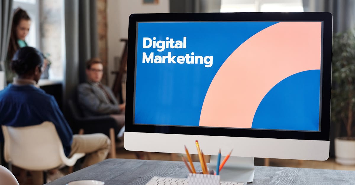 Professionals in a creative office plan digital marketing strategies.